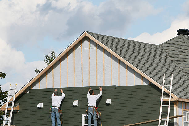 Professional Siding technician working in East Waterford, PA